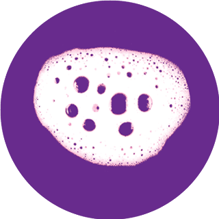 White bubbled foam on purple circle background