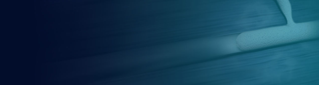 Faded blue background with Varithena foam in vein.